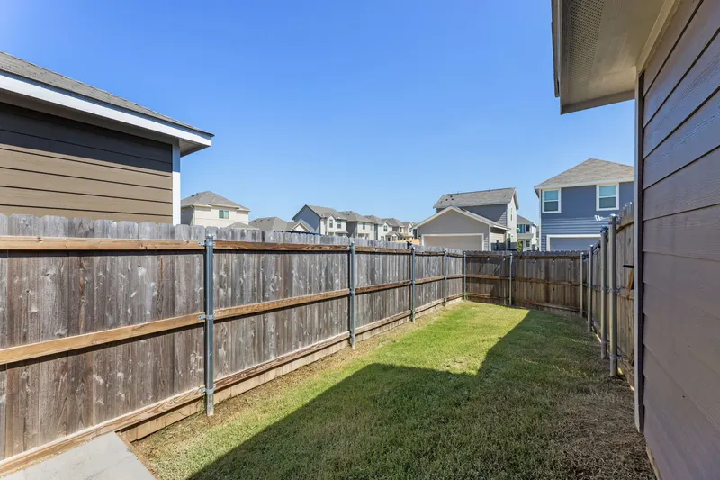 Side yard along the fence